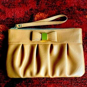 Like new wristlet, only used once or twice. Cognac color.